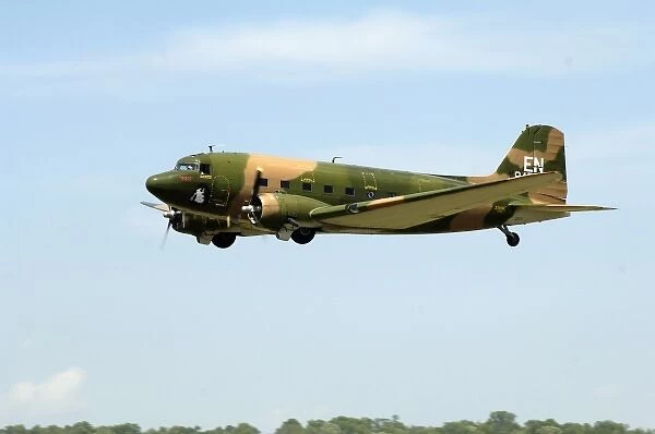 Douglass DC-3  /  C-47 Puff flying in the sky