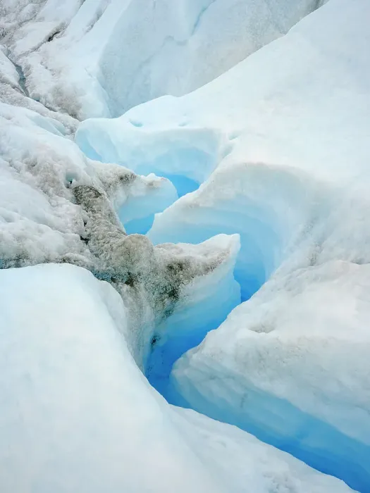 Framed Print : Drainage system on the surface of the ice sheet. The brown sediment on the ice is created by the rapid melting of the ice. Landscape of Greenland near Kangerlussuaq, Kingdom of Denmark