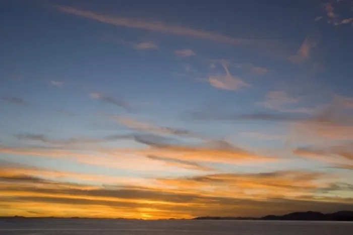 Framed Print : Dramatic clouds over lake at sunset, viewed from Suasi Island (also known as Isla Suasi)