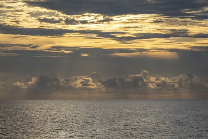 Framed Print : Dramatic skies, rain, sunbeams, sunset colors kiss the horizon of the Gulf of Mexico, Florida