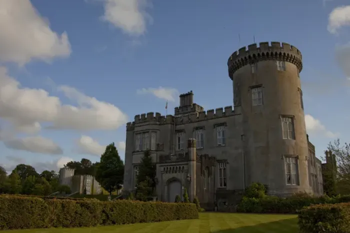 Framed Print : Dromoland Castle Hotel in Newmaket-on-Fergus, Ireland, side view under a blue sky