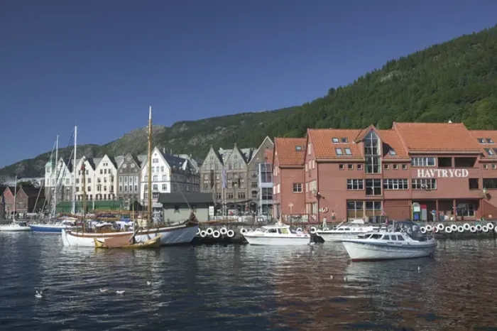 Framed Print : In the back drop of Bryggens ancient buildings Bergens harbor offers tours Framed Print : In the back drop of Bryggens ancient buildings Bergens harbor offers tours