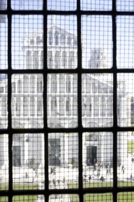 Framed Print : Duomos facade seen from a Baptistrys grilled window