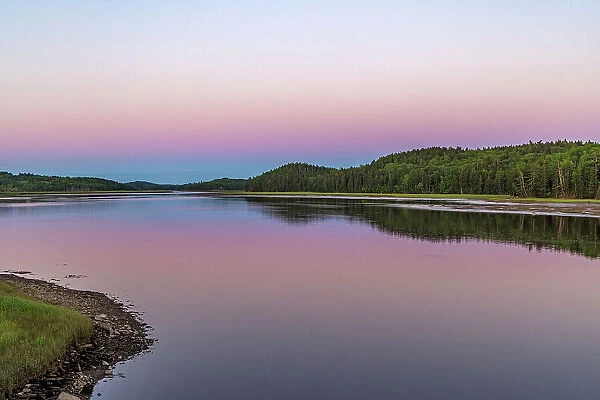 Dusk colors the Machias River in Machias, Maine, USA