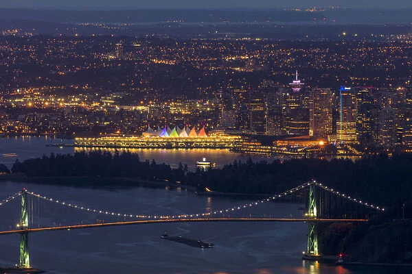 Dusk view of Lions Gate Bridge and Canada Center cityscape from Cypress Road in Vancouver