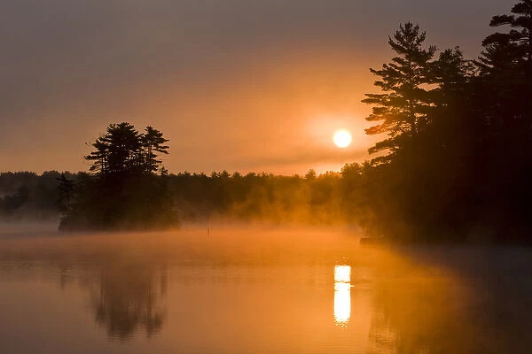 Early morning on Pawtuckaway Lake as seen from Horse Island in New Hampshire s