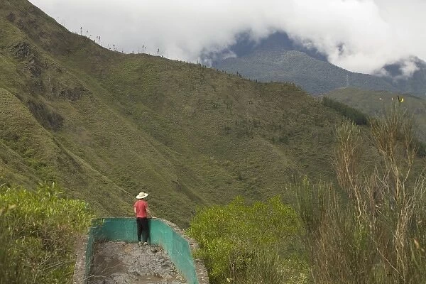 Ecuador, Banos, woman gazing at panoramic view at Ecozoologico San Martin (MR)