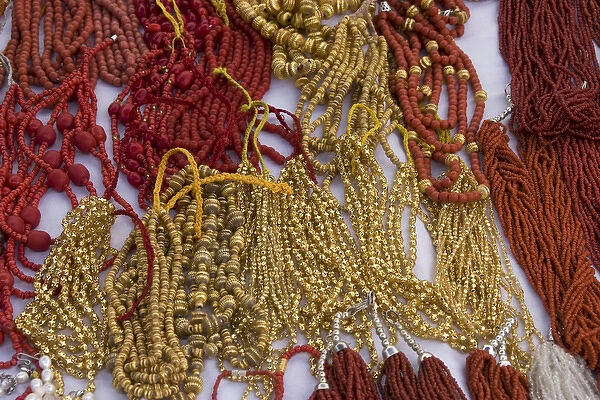 ECUADOR, Imbabura Province, Otavalo. Glass and metal beads in the Otavalo Market