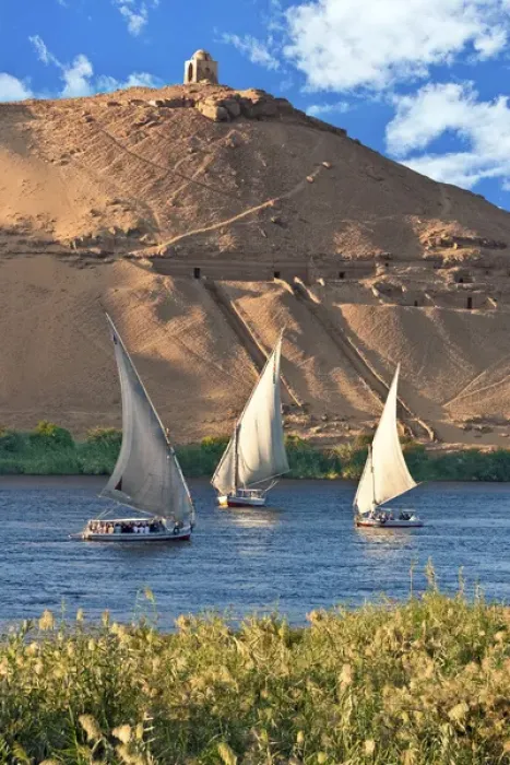 Framed Print : Egypt, Aswan, Nile River, Felucca sailboats, temple ruins and the large sand dunes