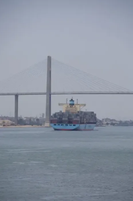 Framed Print : Egypt, Suez Canal. Cargo ship passing under Bridge of Peace (aka Peace Bridge)