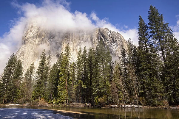El Capitan seen from Cathedral Beach with reflection in Merced River. Yosemite National Park
