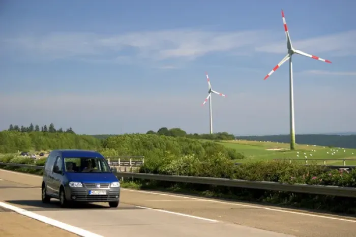 Framed Print : Electricity wind generators and automobiles traveling on the autobahn in northwest Framed Print : Electricity wind generators and automobiles traveling on the autobahn in northwest