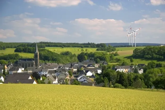Framed Print : Electricity wind generators near a village in northwest Germany Framed Print : Electricity wind generators near a village in northwest Germany