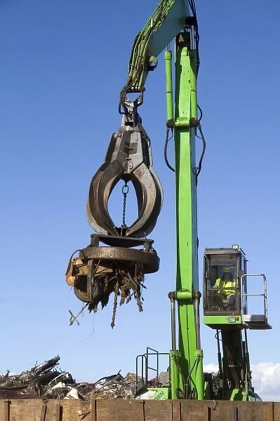 Electromagnetic crane lifting scrap steel for recycling at the Pacific Steel