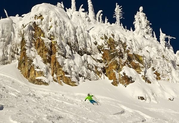 Eleven-year-old Parkin Costain skis on a sunny day at Whitefish Mountain Resort in Montana