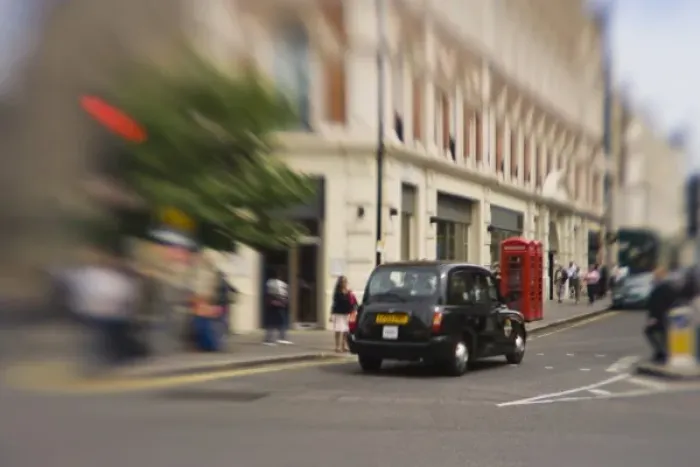 Framed Print : England, London. Black taxicab zooms through Londons streets Framed Print : England, London. Black taxicab zooms through Londons streets