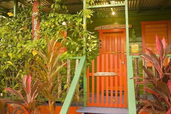 Entrance to beach house painted in bright colors, Placencia, Stann Creek District, Belize