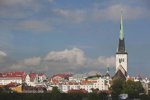 Estonia, Tallinn, town view from harbor with St. Olafs Church, morning