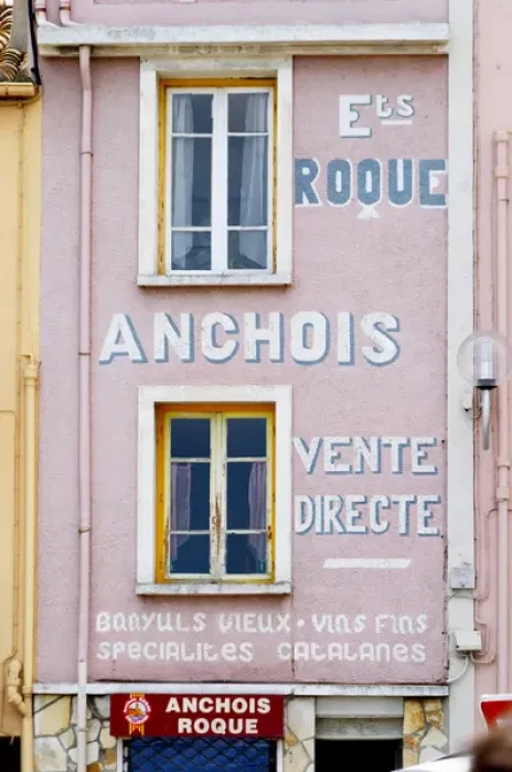 Framed Print : Etablissement Roque Anchois anchovies shop, house painted with advertising in white and pink Framed Print : Etablissement Roque Anchois anchovies shop, house painted with advertising in white and pink