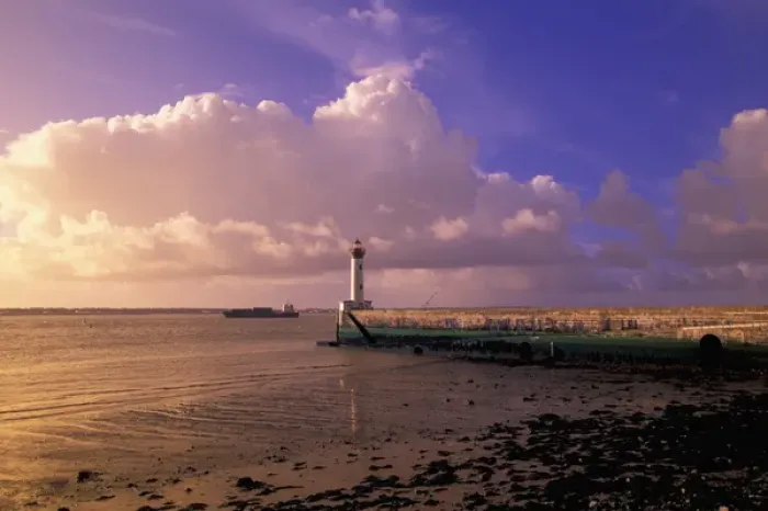 Framed Print : EU, France, Brittany, Loire Atlantique, St. Nazaire, St. Nazaire Lighthouse and Freighter