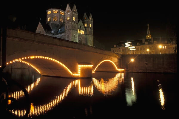 EU, France, Metz. Illuminated bridge and church