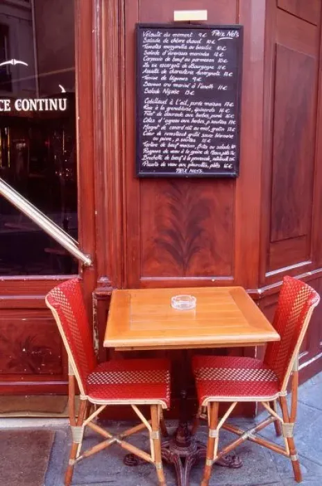Framed Print : EU, France, Paris. Two chairs in front of a Parisian bistro