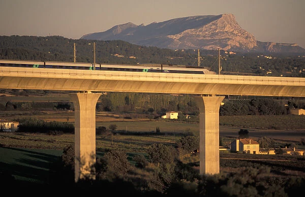 EU, France, Provence, Bouches-du-Rhone, Montagne Sainte Victoire. TGV (high speed train)