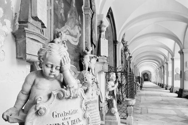 Europe, Austria, Salzburg. Cherub and monument at Sebastianskirche Cemetary