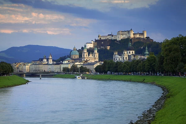 Europe, Austria, Salzburg. View along the Salzach River across city to Hohensalzburg