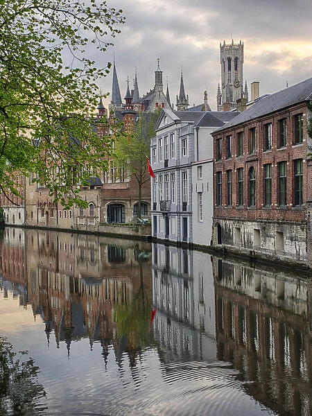 Europe; Belgium; Brugge; West Flanders; Canal Scene with homes and Bridge