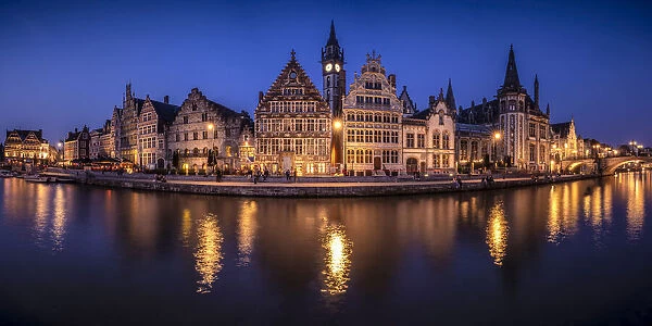 Europe, Belgium, Ghent. Panoramic of town and canal reflections at night