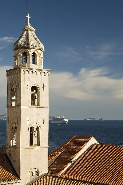 Europe, Croatia, Dalmatia, Dubrovnik. Cathedral belltower, red tile roofs and a