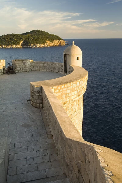 Europe, Croatia, Dalmatia, Dubrovnik. Old city walls (built 10th century) above Adriatic Sea