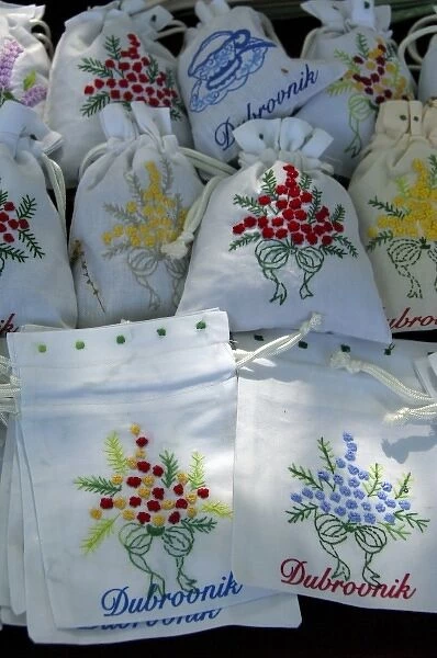 Europe, Croatia, Dubrovnik. Typical hand embroidered souvenir textiles