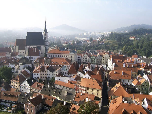 Europe, Czech Republic, Cesky Krumlov. Autumn mist spills over the medieval town