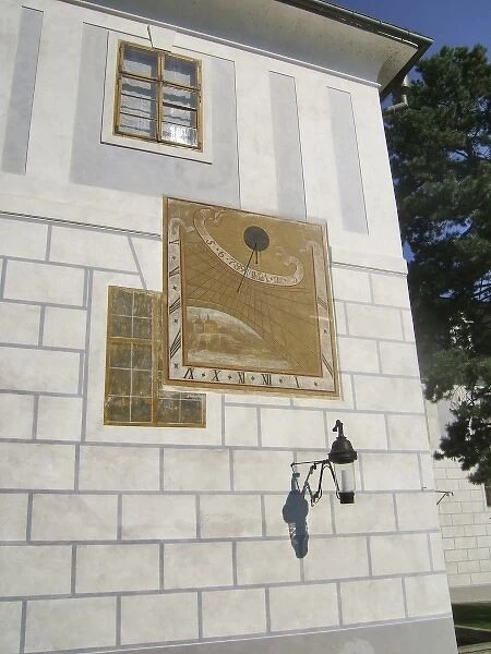 Europe, Czech Republic, Cesky Krumlov. An ornate sundial covers the side of a building