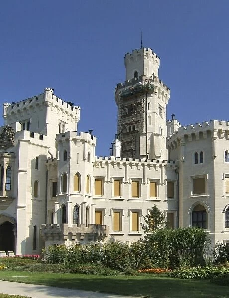 Europe, Czech Republic, Hluboka Castle. Workers repair the main tower at Hluboka