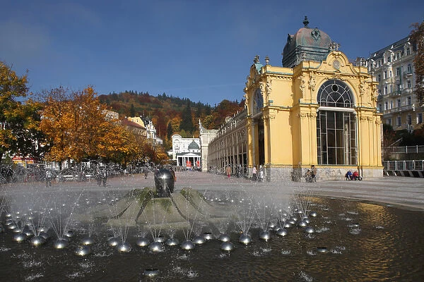 Europe, Czech Republic, Marianske Lazne. Singing Fountain with Colonnade in the background