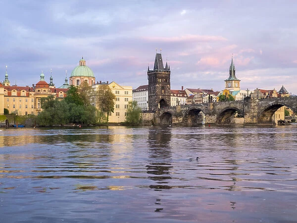 Europe, Czech Republic, Prague. View of the Lesser town bridge tower and clock tower