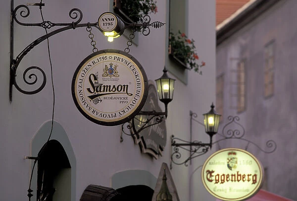 Europe, Czech Republic, South Bohemia, Cesky Krumlov Inner town cafe signs, evening
