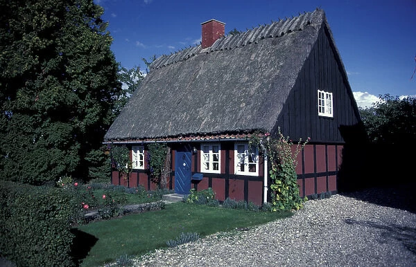 Europe, Denmark, Fyn Island. Thatched roof cottage