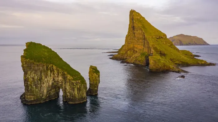 Framed Print : Europe, Faroe Islands. Aerial view of Drangarnir and Tindholmur off the coast of Framed Print : Europe, Faroe Islands. Aerial view of Drangarnir and Tindholmur off the coast of