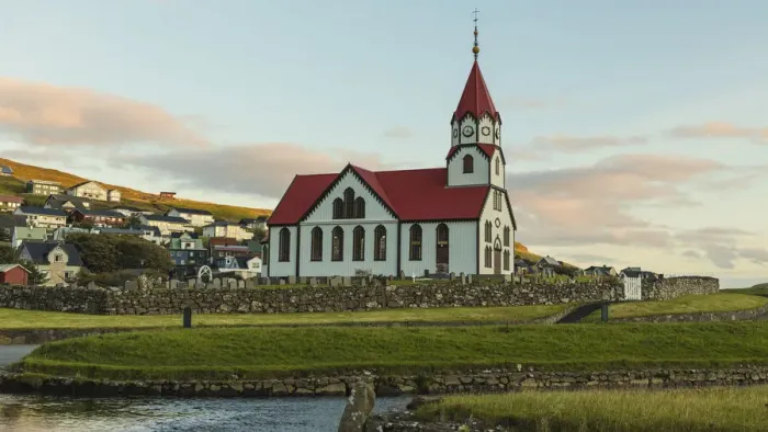Framed Print : Europe, Faroe Islands. View of the Sandavags kirkja, a church in the village of Framed Print : Europe, Faroe Islands. View of the Sandavags kirkja, a church in the village of