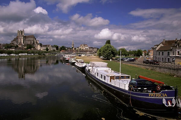 Europe, France, Burgundy, Auxerre. View of the Cathedral and Yonne River barges
