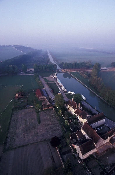 Europe, France, Burgundy, Tanlay. Aerial view of Burgundy Canal from hot air balloon