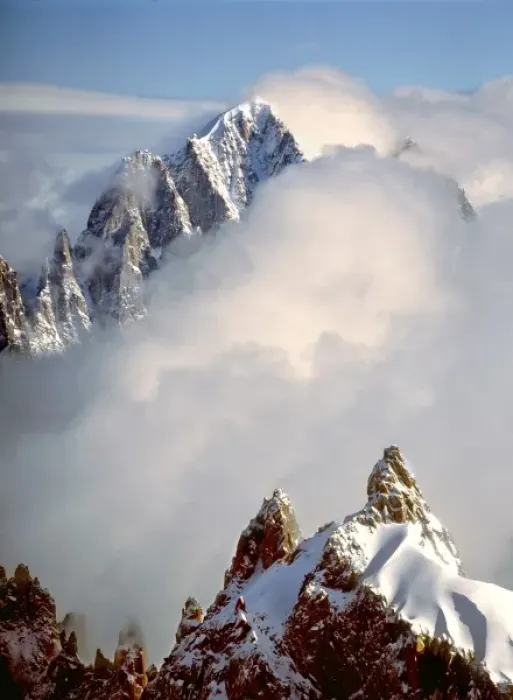 Framed Print : Europe, France, Chamonix. The jagged spires of Aiguilles du Midi capture the clouds Framed Print : Europe, France, Chamonix. The jagged spires of Aiguilles du Midi capture the clouds