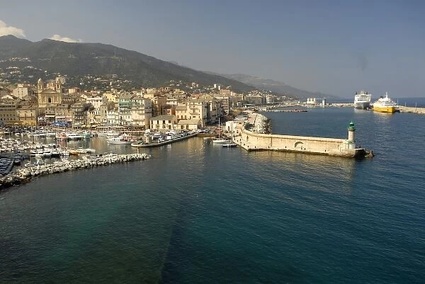 Europe, France, Corsica, Bastia. Vieux Port and St Nicholas Harbor visible from ramparts