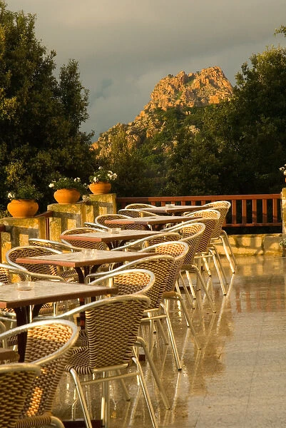 Europe, France, Corsica, Piana. Elegant outdoor dining option at Hotel des Roches Rouges
