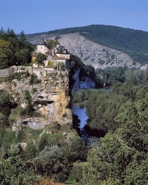 Europe, France, Dordogne River. The Dordogne River meanders below Le Cave Chateau