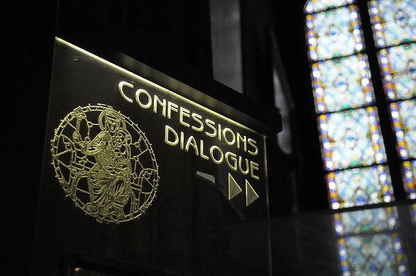 Europe, France, Paris. Confessions Dialogue sign, Notre Dame Cathedral